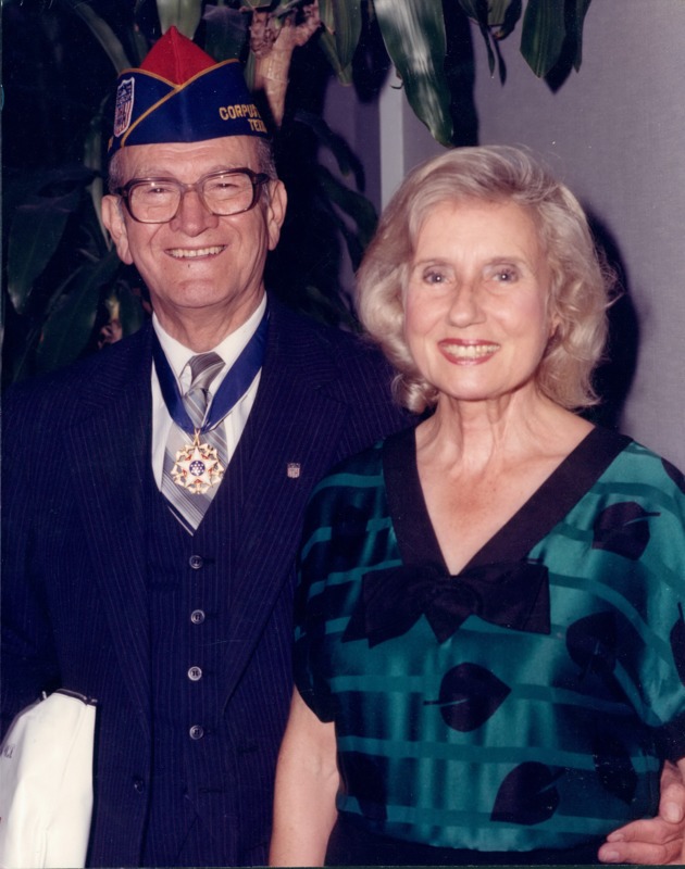 Photograph of Dr. Garcia and his wife Wanda with Dr. Garcia's Medal of Freedom. 