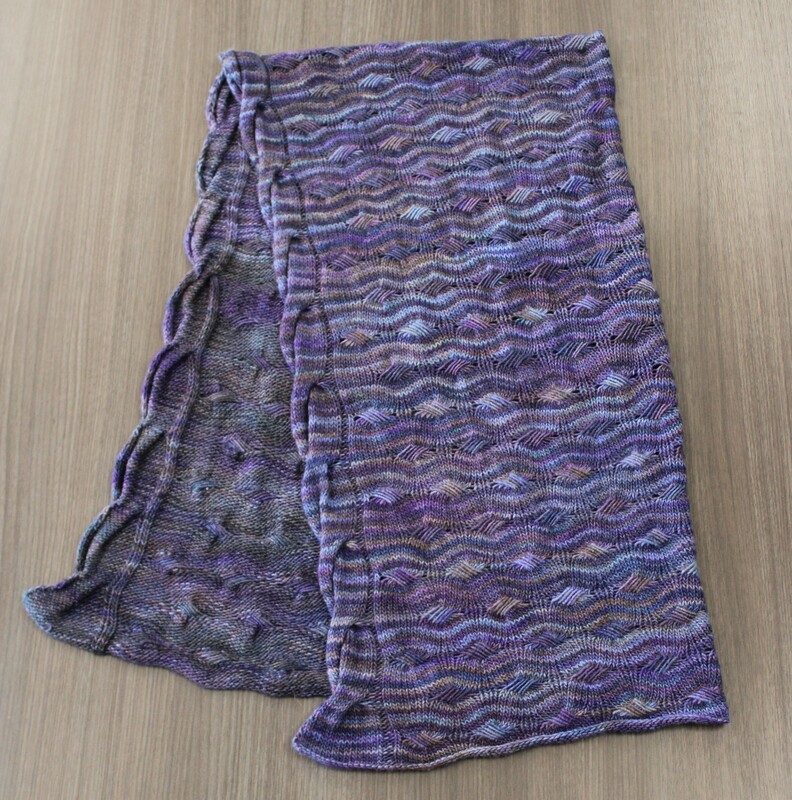 Knitted wrap in shades of purple