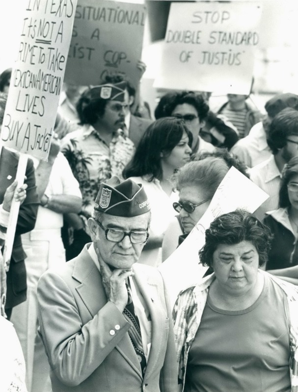 Photograph of Dr. Garcia and his sister Clotilde at a protest for the murder of Jose Campos Torres. 