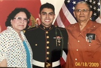 Marie Vasquez, grandson Sergeant Nathan R. Schoggins, and Arturo Vasquez.