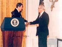 Photograph of Dr. Garcia receiving his Presidential Medal of Freedom from President Reagan. 