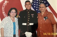 Marie Vasquez, grandson Corporal Daniel G. Martinez and Arturo Vasquez. 