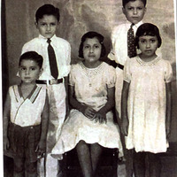 Arturo Vasquez posing for a photo with his siblings, Enrique, Altagracia “Yayita”, Rodolfo, Jr. "Fito", and Gloria Alicia "Lecha"