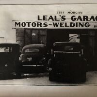 Black and white photograph of Leal's Garage.