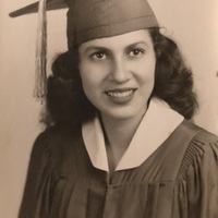 Marie Leal's W. B. Ray High School graduation photo. Black and white photograph. 
