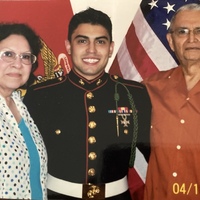 Marie Vasquez, grandson Sergeant Nathan R. Schoggins, and Arturo Vasquez.