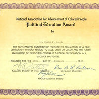 Photograph of Dr. Garcia's Political Education Award from NAACP. 