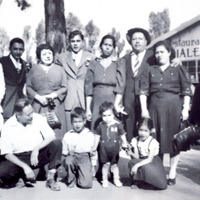 A Black and white family photo featuring Arturo Vasquez, Aunt Soledad “Chole” Juvera, and Rodolfo Vasquez, Jr.