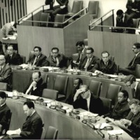 Photograph of Dr. Garcia sitting among other delegates at the United Nations. 
