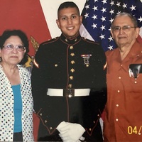 Marie Vasquez, grandson Corporal Daniel G. Martinez and Arturo Vasquez. 